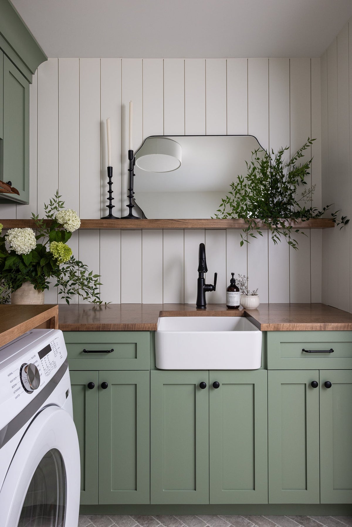 green cabinets laundry room